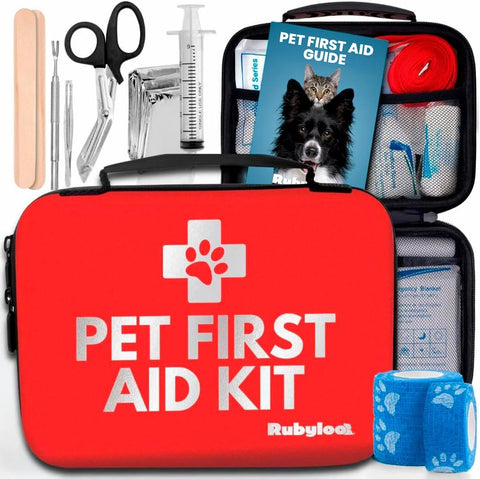 Pet first aid kit in a red Rubyloo case; includes scissors, syringe, tick remover, bandages for dogs and cats.