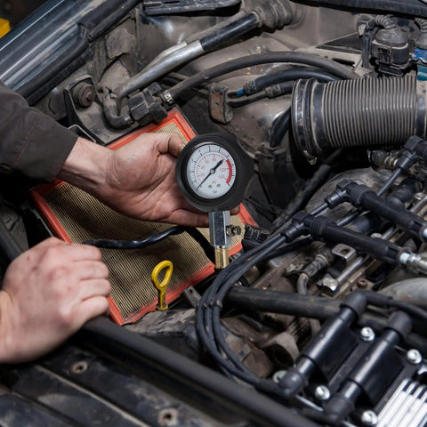 QUNNIE oil pressure tester kit gauge 0-140 psi; close-up view in car engine bay