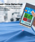 Genuine Static Meter And Electrostatic Fieldmeter For Quick ESD Touch Ups Measuring Zero To Plus Or Minus Twenty Kilovolts With Tight Accuracy and Ion Balance Checks For Garage Pros in hand with LCD display.