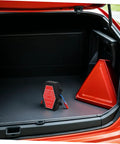 Hella Compact Self Activating Automotive Fire Extinguisher Straight Up Rapid Flame Suppressant Aerosol Emergency Kit in car trunk.