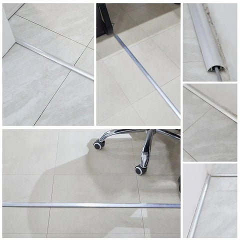 Self Adhesive Metal Cable Concealer For Floors And Desks Black Aluminum Cord Hider in use on tiled floor in office setup