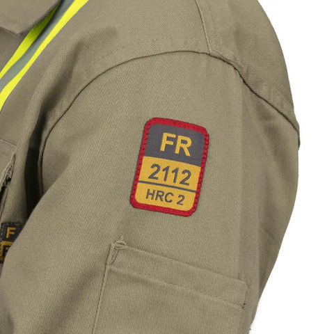 Workhorse Flame Resistant Coveralls Featuring Bold High Visibility Striping And Soft Cotton Nylon Blend For Straight Up Comfortable Daily Hazardous Environment Safety Wear patch detail on sleeve