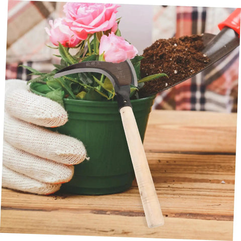 Multipurpose Manganese Grass Sickle With Handle Ergonomic Gardening Tool next to potted plant