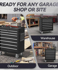 Rolling Tool Chest With Seven Drawers On Wheels, Metal Lockable Tool Storage Cabinet With Swivel Casters And Brakes, Heavy Duty Toolbox For Garage, Workshop, Warehouse Or Repair Shop, Black in garage and warehouse settings