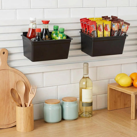 6 Pack Slat Wall Bins Durable Plastic Storage Bins For Workshops And Retail Stores with sauces and snacks displayed on a slat wall.