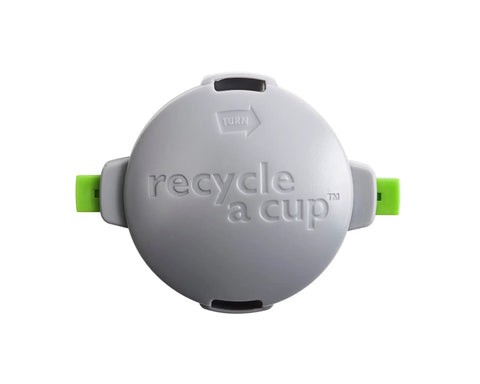 Top view of Recycle A Cup K Cup Cutter for Quick Single Serve Recycling Coffee Or Tea Pod Separator Tool showing logo and green tabs.