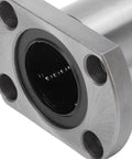 Front view of silver flange bearing with four mounting holes and dark inner bore.