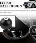 Black 8 Ball Steering Wheel Knob Spinner installed on car steering wheel for easy backing up and quick turns.