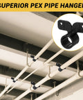 Multiple PEX pipe hangers installed on white ceiling pipes; black nylon R-type clamps with screws (3/4 in).