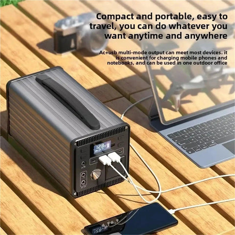 Heavy Duty Portable Power Station 220V Solar Generator With Multi Outlets Compact Backup Energy Kit Trail Ready For Campouts Road Trips Black on wooden table.