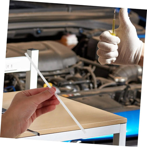 Person holding one of 10 Pcs Car Bumper Welding Rods for Quick Bumper Repairs in auto shop setting, white PP material, DIY friendly