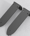 Heavy Duty Wall Mounted Shelf Brackets 2 Pack Black Iron Metal L Shape Floating Supports For Diy Open Shelving Includes Hardware on a textured wall.