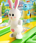 Epic Motion Sensing Two Player Racing Game With Three Play Modes Interactive Competitive Board Experience For Family Game Night Friends Hangouts And Social Events Easy Setup And Quick Start Fun, bunny and turtle figures on plastic track