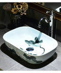 Rectangular Ceramic Vessel Sink For Bathroom Vanity Featuring A Super Sleek High Gloss Glaze That Stays Hella Tough And Keeps Your Space Looking Fresh All Year Round, 43x30x13 cm ceramic sink with floral design.