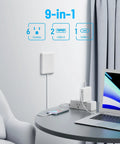 Ultra Flat Extension Cord With Outlet Cover And Power Strip That Fits Like A Glove In Tight Spaces Featuring Six Ac Outlets Plus Three Usb Quick Charge Ports Along With Five Foot Heavy Duty Cable And Reliable Safety Breakers, mounted beside a desk.