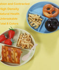 Eight Pack 9 Inch Divided Plates With Spoons Set shown with snacks and fruit, colorful plastic design for portion control meal prep.