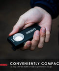 Hand holding 500-Lumen LED COB Work Flashlight With Rechargeable Battery, Dimmable Output, Slim Black Tool Light