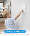 Child attempting to toggle a switch with 4 Pack White Toggle Switch Guard Covers That Screw On To Lock Your Switches In Place For Kid Safety And Appliance Protection Universal Fit No Fuss Setup installed.