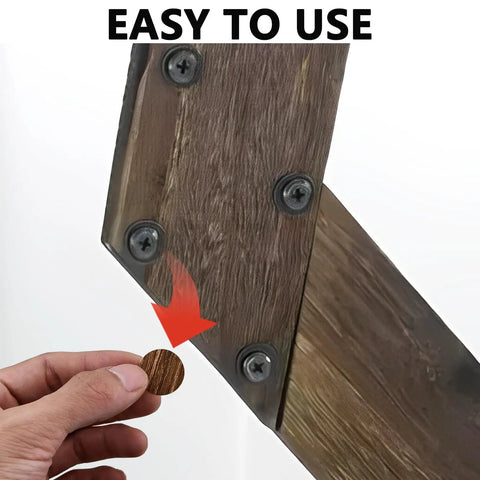 Hand holding a brown Slick Brown Screw Hole Cover Sticker, ready for installation on wood, showcasing ease of use.