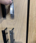 Matte Black Edge Pull Pocket Door Handles in Stainless Steel 304 with flush mount design on wood surface, rust resistant satin finish