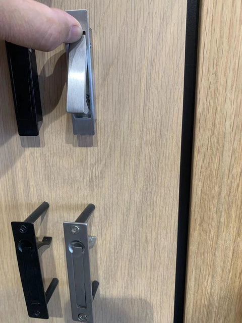 Matte Black Edge Pull Pocket Door Handles in Stainless Steel 304 with flush mount design on wood surface, rust resistant satin finish