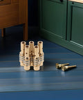 Hot Deal 10pcs Alloy Welding Torch Contact Tip Holder Diffuser Assembly For Mig Mag Guns stacked golden alloy diffusers on blue floor.