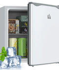 Sleek Compact Countertop Mini Freezer With Removable Shelves And Cool Gray Housing Perfect For Dorms And Apartments A Sick Game Changer Keeping Meats Seafood Ice Frozen Solid Daily, showing opened compartment with beverages.