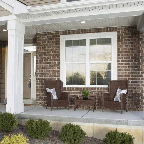 Front porch with brick wall and large window featuring Heat Control Platinum Window Film For DIY Install Energy Saving Sun Blocking Tint