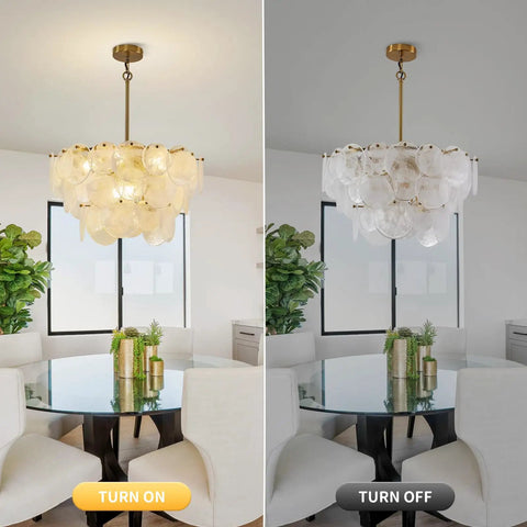 23 Inch 9 Light Gold Glass Chandelier 3 Tier Round Crystal Pendant Light Height Adjustable illuminating a dining room table.