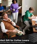 Keep Your Coffee Tea And Cocoa Toasty With This Slick Black Four Pack Electric Cup Heater Boasting Three Custom Heat Levels And A Universal Mug Fit That Slides Right Into Every Office Or Home, showcased in a cozy home office.