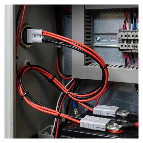 Heavy Duty 50A 12AWG Double Y Adapter Conector Plug With Color Coded Red And Black Housing and wire stop connected in battery setup.
