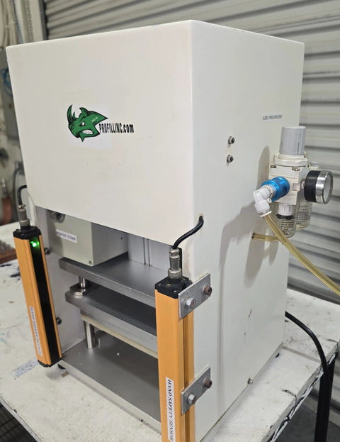 Workhorse Benchtop Pneumatic Press With Foot Pedal For Hands Free Operation, Dual Safety Light Curtains, And Adjustable Dwell Timer For Blister Packaging, Stamping, Riveting, And Component Assembly white benchtop unit with air regulator