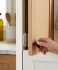 Installing No Drill Magnetic Cabinet Door Catch With Adhesive Backing on wooden cabinet in kitchen, easy install, corrosion resistant.