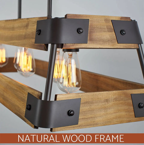Close-up of rustic modern farmhouse kitchen island light with wood panel rectangular frame, oil-rubbed bronze accents, and bulbs