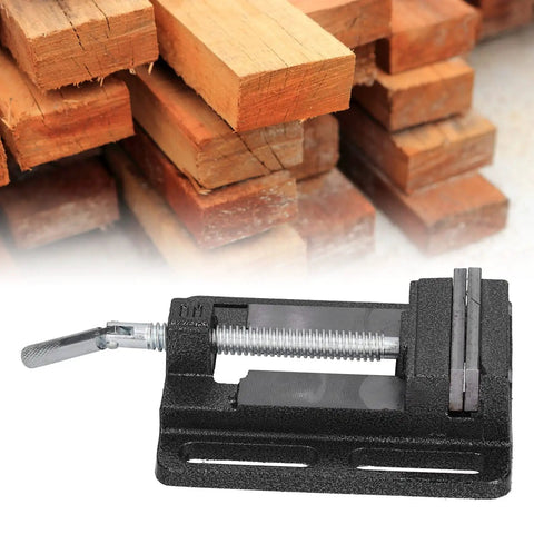 Mini Bench Vise 6.1 By 5.5 Inch Cast Iron Drill Press Vise with Rotatable Workbench Clamp, stacked wood backdrop