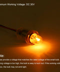 Straight Up Solid E10 Miniature Bulbs 30V 3W Warm Yellow Glass Lamp with Screw Base illuminating in warm light.