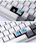 Fifty Pack 3 Pin Blue Clicky Mechanical Keyboard Switches For Typing And Gaming With 50gf Actuation Crisp Audible Feedback 2.2mm Actuation Point 4mm Travel Distance Durable Build For Tactile Lovers on white keyboard