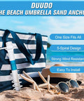 Windproof Beach Umbrella Sand Anchor with Five Spiral Screw Design next to a striped bag on the beach.