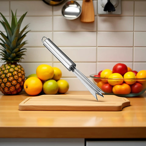 Pineapple Eye Remover Tool With V Shaped Stainless Steel Blade on kitchen counter with fruits, ergonomic handle kitchen gadget