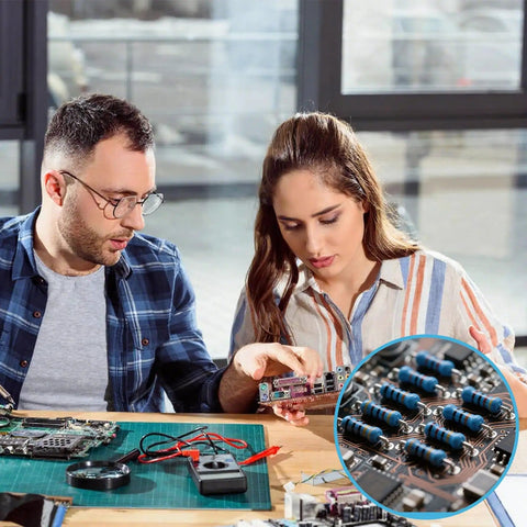 Two people working on electronic repairs with a close-up of a 2600-Piece One Quarter Watt Metal Film Resistor Kit With 130 Values From One Ohm To Three Megaohm, One Percent Tolerance, Breadboard Friendly Assortment For DIY Electronics Repairs Projects And Pro Builds.