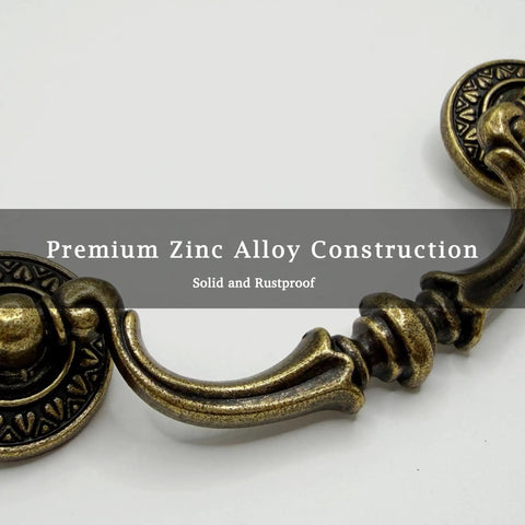 Close-up of Six Pack Antique Brass Drop Bail Pulls For Furniture Standard Three And A Half Inch Center To Center Cabinet Handles