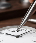 Close-up of Metal Watch Hands Set Compatible With NH35 364R 7S Movements being installed on a watch, black finish.