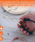 Hand holding 7 Inch Long Needle Nose Pliers For Jewelry Making And Wire Looping, showing smooth jaws and anti slip handles at workspace.