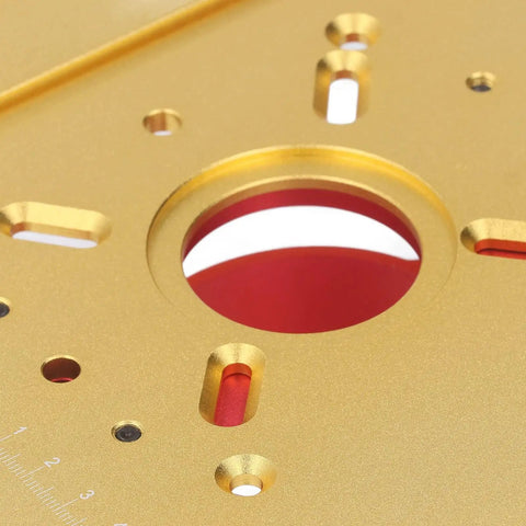 Close-up of Dead Nuts Accurate Manual Router Uplift System aluminum lift plate with router bore hole and measurement markings.