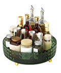 9 Inch Lazy Susan Turntable One Tier Spinning Organizer For Kitchen And Pantry Grab And Go Convenience Cabinet Refrigerator 360 Degree Rotating Spice Rack Dark Green Non Slip Surface Keeps Spices Easy Reach And Neatly Organized In Any Cabinet shown holding assorted spice jars and bottles with a textured rim.