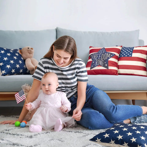 Woman and baby with Patriotic 18x18 Inch Throw Pillow Covers Set Of 4 For Fourth Of July Independence Day American Flag Stars And Stripes Cushion Covers For Sofa Couch Bed Outdoor Home Decor on sofa