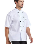 Unisex Chef Coat With Short Or Long Sleeve Crafted From Breathable Cotton Poly Blend, white, double-breasted design, worn by a male chef.