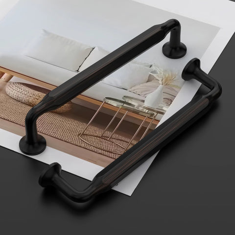 Oil Rubbed Bronze Cabinet Pulls 5 Inch 10 Pack Kitchen Cabinet Hardware, showing two pulls on a black surface with decor background.