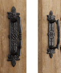 Heavy Duty 9 Inch Antique Barn Door Handle Set Of 4 For Gates Garages And Sheds Rustic Carved Door Pulls Built Tough With Solid Steel Construction And Frosted Black Powder Coated Finish, close-up view on wooden door.