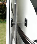 Heavy Duty Stainless Steel 6 Inch T Style RV Door Holder installed on a camper, showing door secured open outdoors